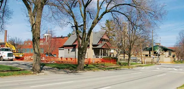 Looking east down Lawrence you can see at left where a house was torn down to make additional parking space for Dana-Thomas House visitors.