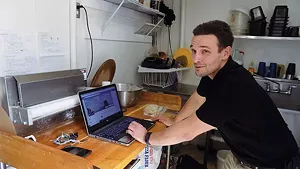 Accepted by the University of Illinois and waiting to hear from Harvard, Jason Spyres doesn’t figure on making pizzas for much longer. - PHOTO BY BRUCE RUSHTON