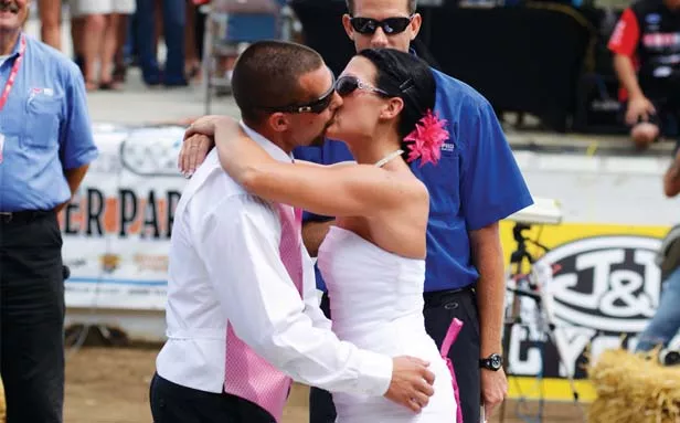 Competitors on the track, longtime couple Jared Mees and Nichole Cheza couldn’t think of a better place to get hitched than the Springfield Mile. - PHOTO BY TREVOR MILLER