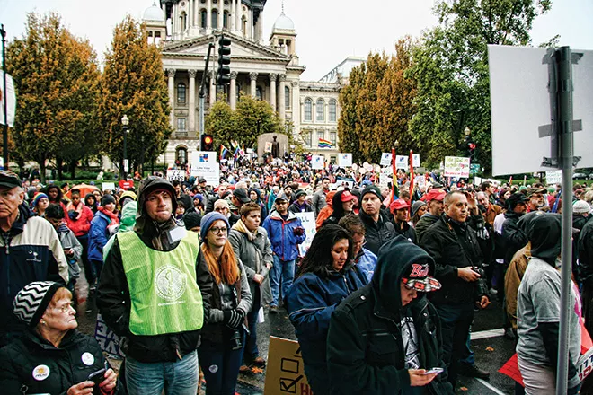 Supporters of same-sex marriage fill the intersection of Second Street and Capitol Avenue in front of the Illinois Statehouse, demanding passage of a bill lifting the state’s ban on same-sex marriage. - PHOTO BY PATRICK YEAGLE