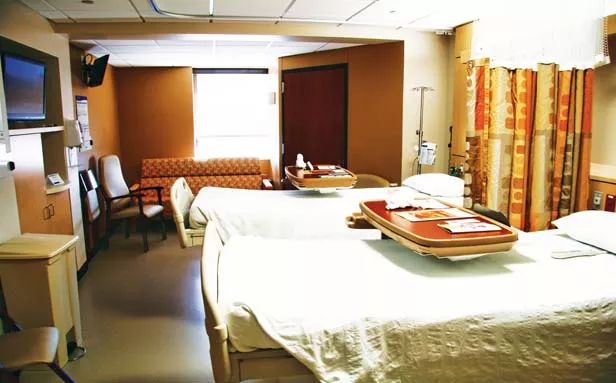 Renovated patient rooms at St. John’s Hospital will all be private, but this one is temporarily double-bunked while the two remaining floors are under construction. - PHOTO BY PATRICK YEAGLE