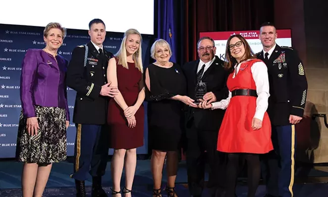 In March, Ken and Judy Osborne were awarded the Blue Star Neighbors Award by Blue Star CEO Kathy Roth-Douquet, who says, “A simple formula for creating relationships is people plus people over time, plus goodwill, equals a relationship and, in a lar