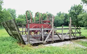 Near the Trail of Hope are replicas of the covered wagons and wooden sleds that the Mormons used to cross the Mississippi River. - PHOTOS BY JOHN CAMPER