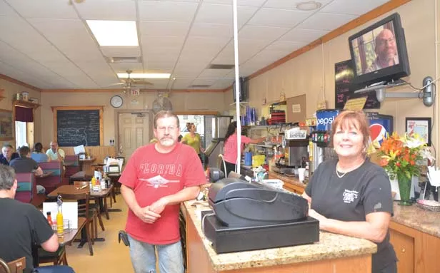 Bill Shroyer and his former employer, Debbie Hill, are both enthusiastic supporters of work-release. Debbie’s Diner is near the Adult Transition Center in Decatur and has employed numerous men from the work-release program. - PHOTO BY GINNY LEE