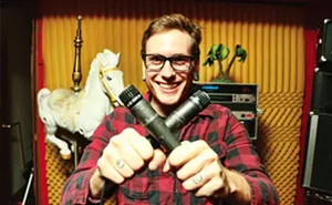 Engineer and musician Brandon Carnes with equine friend at Southtown Recording Studios. - PHOTOS BY PATRICK YEAGLE
