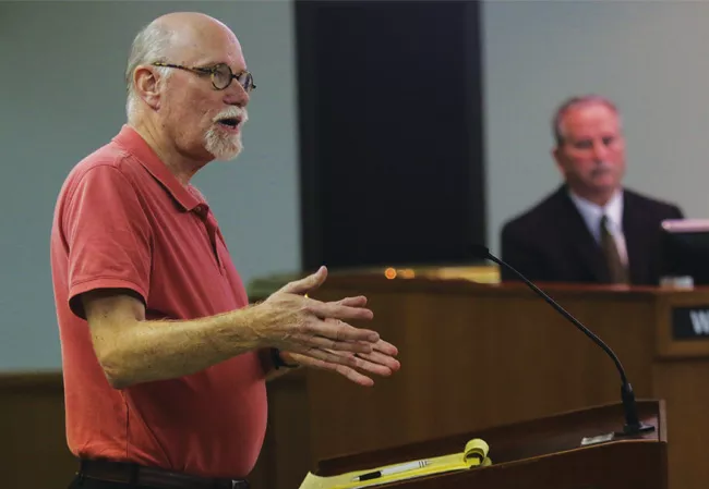 Springfield architect Mike Jackson, who advocates preserving the Y building, addresses the city council. - PHOTO BY PATRICK YEAGLE