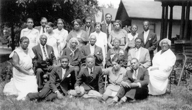 A 1930s family gathering at 1611 East Jackson St. after the funeral of Thomas Artis, patriarch of the Artis family. - COURTESY SANGAMON VALLEY COLLECTION, LINCOLN LIBRARY