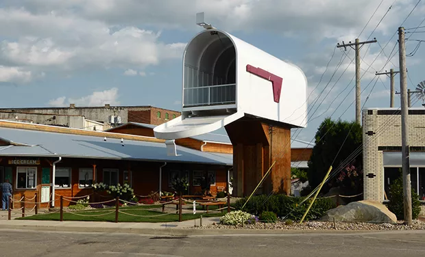he world’s largest mailbox in Casey, Illinois, sports a red flag that can be raised when mail is ready to go. At 32 feet tall, the working mailbox towers over downtown Casey, which boasts eight world records. - PHOTO BY BRENT BOHLEN