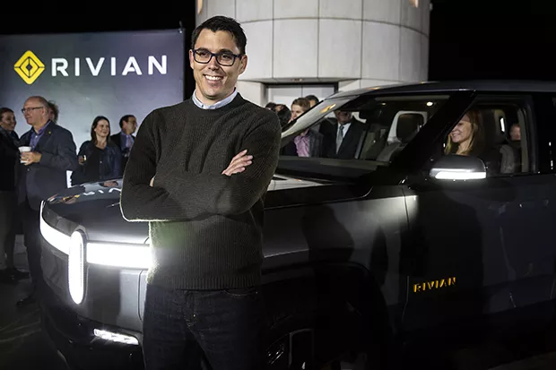 Fans, including Amazon and Ford, are betting that Rivian chief executive officer R.J. Scaringe, foreground, is the real deal who will transform the automotive world. - PHOTO BY KENT NISHIMURA LOS ANGELES TIMES (TNS)