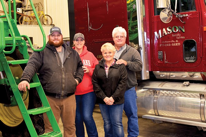 Cody, Brittany, Delores and Andy Mason on their Morgan County farm. - PHOTO BY DAVID BLANCHETTE