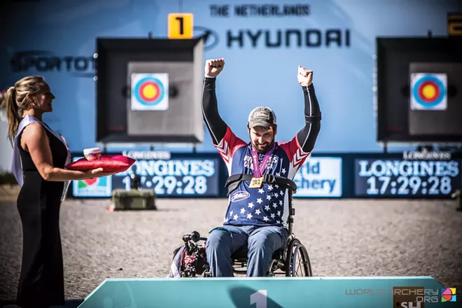 Ben Thompson accepts 2019 World Championship Gold medal at the World Archery Para Championships in Hertogenbosch, Netherlands. - PHOTO COURTESY OF USA ARCHERY