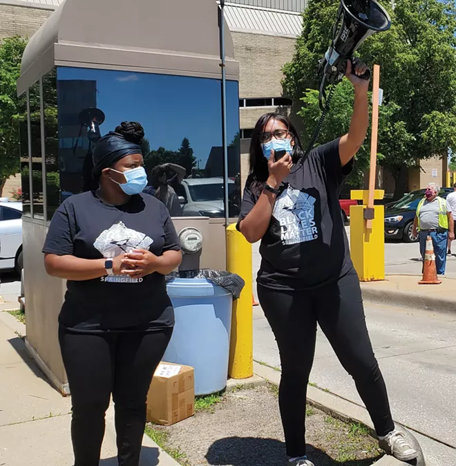 Khoran Readus and Sunshine Clemons lead Black Lives Matter Springfield. They were surprised by the number of people who showed up for the car procession they planned. - PHOTO BY RACHEL OTWELL.