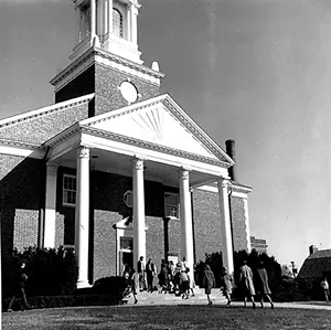 Male and female students enter MacMurray College's Annie Merner Chapel, date unknown. - PHOTO COURTESY MAC MURRAY COLLEGE.