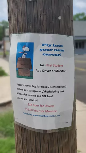 A flyer spotted on the corner of Laurel and State streets advertises openings for bus drivers and monitors. - RACHEL OTWELL