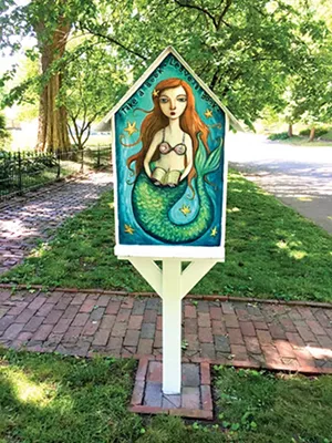 A Little Free Library in the 1500 block of North Third Street is decorated with fairy tale characters. - PHOTO BY DEBBI GEORGE