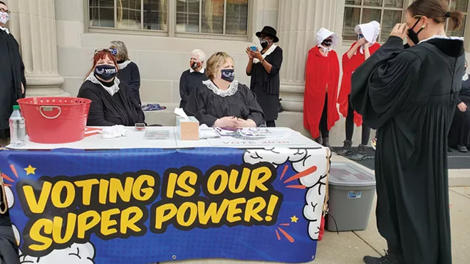 Keri Tate, on left, and Tracy Owens are with the current iteration of Springfield's League of Women Voters chapter and helped organize the photo shoot in Ginsburg's honor. Updated clarification: The shoot was a project of the Resistor Sisterhood, based in Springfield, and was not an official function of the LWV. - PHOTO BY RACHEL OTWELL