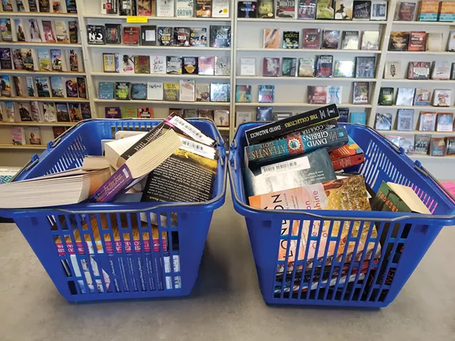 A: Some customers of The Book Rack, a used book store in Springfield, have been buying baskets full of books during the pandemic. - PHOTO BY STEPHANIE BOND