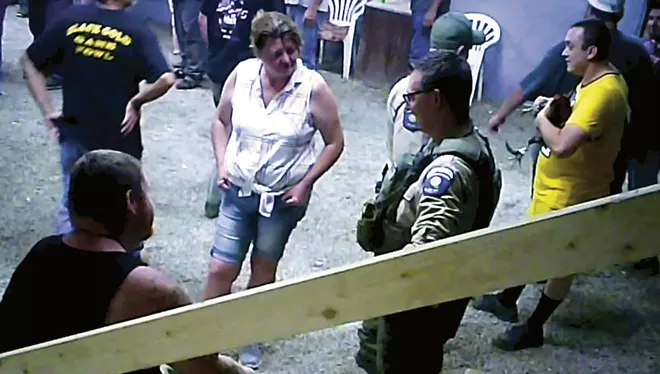 SHARK investigators last summer found sheriff's deputies at Kentucky cockfights. - PHOTOS COURTESY SHOWING ANIMALS RESPECT AND KINDNESS