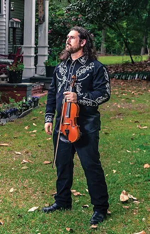 Dennis Stroughmatt's Cajun-Creole Trio entertains at Hill Prairie Winery near Oakford this Saturday evening for a Mardi Gras celebration.