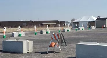 Parking spots designated for those awaiting leftover shots at the SCDPH vaccine clinic on South Grand Avenue East. - RACHEL OTWELL