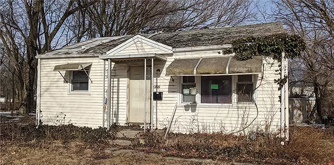 When the city sued two years ago to force fixes to this house, it discovered that the owner had died in 1964. - PHOTO BY BRUCE RUSHTON