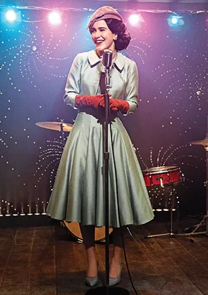 Rachel Brosnahan as Miriam Maisel showcasing a 50s-style dress with an overcoat. - PHOTO COURTESY AMAZON PRIME VIDEO