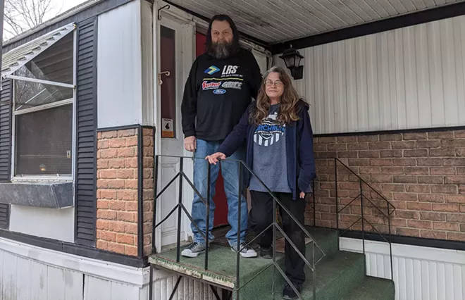 A year ago, Rick and Carla Phelan were in the courthouse with their lawyer Dowin Coffy, fighting to keep a roof over their heads. - PHOTO BY BRUCE RUSHTON