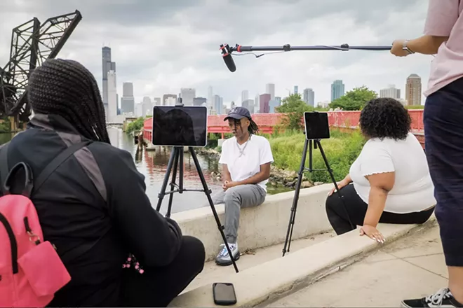 Teens from Chicago working with DePaul University to make a short film. DePaul professor and youth film project coordinator Liliane Calfee gave a presentation as part of the No Malice project. - CREDIT: DEPAUL UNIVERSITY
