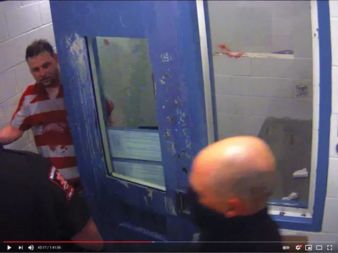 Jaimeson D. Cody faces guards seconds before he's tased during an April 27 struggle. - CREDIT: SANGAMON COUNTY SHERIFF'S OFFICE