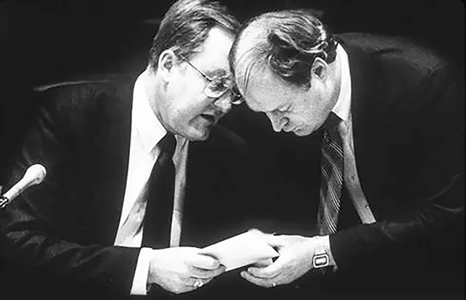 With Governor Thompson convening the Senate in 1987. Stamp writes: “This is the picture that convinced me the comb over just wasn’t getting it done.”