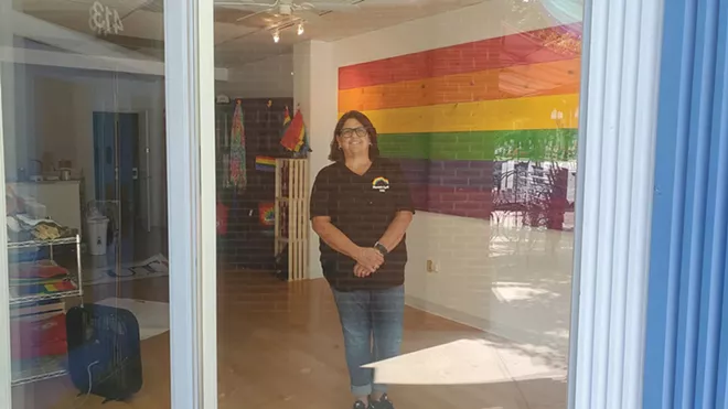 Jonna Cooley stands in the new Phoenix Center storefront on Adams Street as she works on getting it up and running. - CREDIT: RACHEL OTWELL