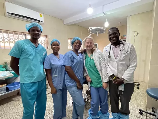 Operating room at International Mission Hospital in Ghana. Medical students Theodore Agbemaple right and Emma Fenner second from right. - PHOTO BY MICHAEL FENNER