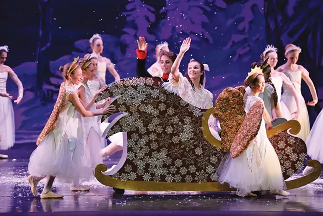 Clara (Olivia Pennell), along with the Nutcracker Prince, makes her way through the snow in the Springfield Ballet's holiday classic The Nutcracker. Right, Erica Wesselman as the Sugar Plum Fairy and Samuel Chester as The Cavalier perform a pas de deux to the romantic music of Tchaikovsky. - PHOTO BY DONNA LOUNSBERRY.