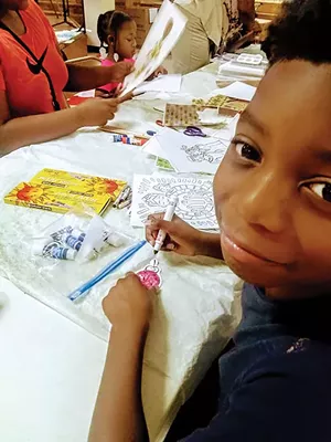 The Garvey-Tubman Center’s early learning initiatives include literary activities, improving finger dexterity, and creative writing.