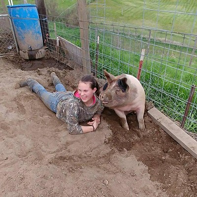 A girl and her pig