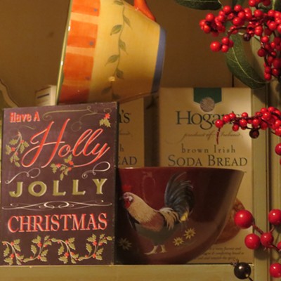 A pretty plaque with a happy holiday message decorates a shelf in Le Ann's Wilson's cozy &nbsp;Christmas kitchen in Orofino.