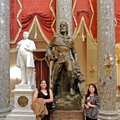 This photo of LC State students Adriana Enriquez-Gonzalez and Ju Hyun Son standing in front of part of Idaho’s and Washington State’s contribution to the National Statuary Hall within the United States Capitol was taken by Leif Hoffmann on March 27, 2024. The students were exploring governmental institutions in Washington, D.C., with Professors Hoffmann and Wartel during spring break. The Hall is devoted to sculptures of prominent Americans, showing here Idaho’s first governor George L. Shoup and American physician and missionary Marcus Whitman.