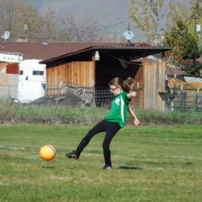 Anna kicking soccer ball