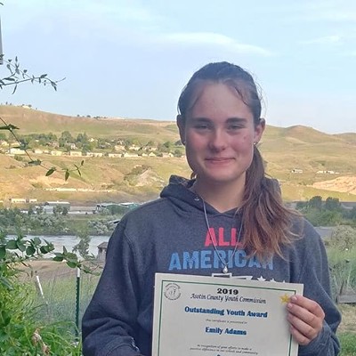 Emily Adams, 14, received an award from the Asotin County Youth Commission for Outstanding Youth in Asotin County. She was nominated by Krista Lathrop for helping her son during the Asotin County Fair. The photo was taken May 22 at Emily's Clarkston home by Susan Adams.