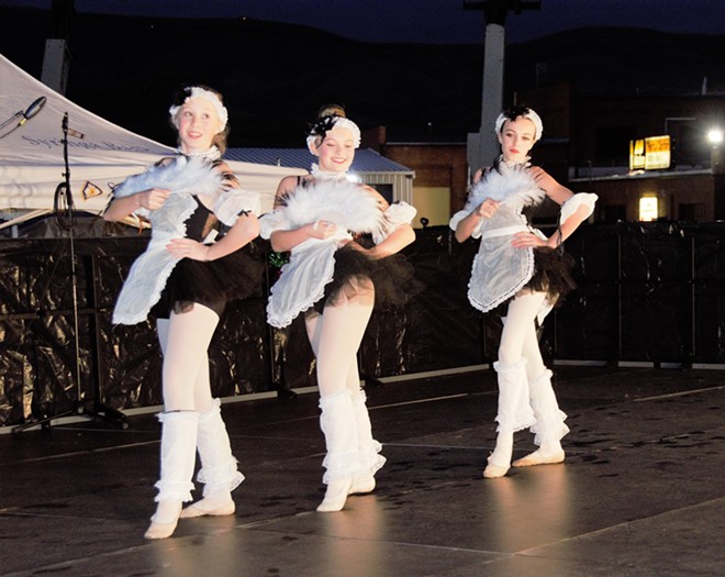 Beautiful Dancers Performing on Stage
