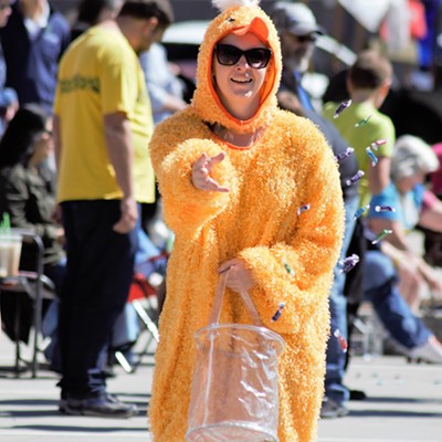 A participant in the Asotin County Parade tossing some candy. April 29, 2017 Taken by Richard Hayward Clarkston, Washington.