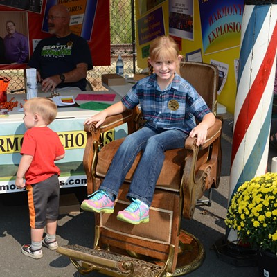 Checking out Daddy's booth