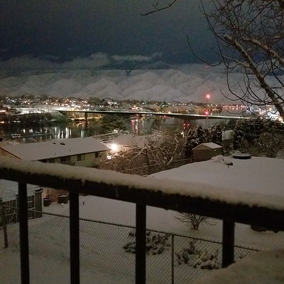 View from our deck of the new snowfall and both bridges lights reflecting off the river. Picture taken by Sue Young from her Lewiston home on 2-11-19.