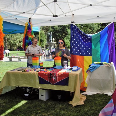 This was one of the booths at Celebrate Love and such friendly faces. Taken at Pioneer Park July 13, 2019 by Mary Hayward of Clarkston.