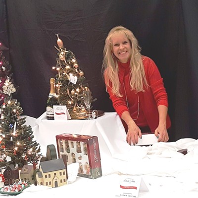 Festival of Trees, a major funding event of the Tri-State Hospital foundation, was again a huge success in November in large part because of Joyce Keefer, the Foundation's Lee Martin Award's most recent recipient, seen here happily hard at work.
    
    Date: 11-24-2016
    Where: Nez Perce County Fair Pavilion
    Photographer: Nan Vance
    Person in photo: Joyce Keefer&nbsp;of Clarkston, WA.