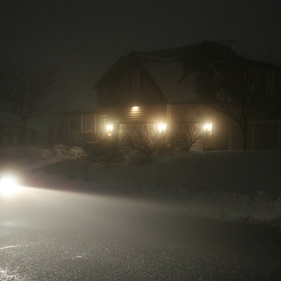 Headlights of a car cut through the fog in Pullman on Valentines Day. Photo taken by Keith Collins on February 14, 2019.