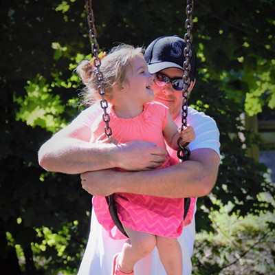Our granddaughter Lila was having so much fun with her daddy Richard on the swings at Swallows Nest Park, May 22, 2017. Taken by Mary Hayward of Clarkston.