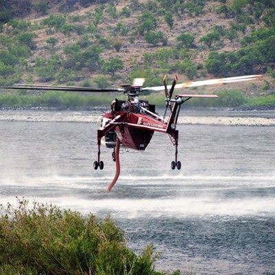 This helicopter was getting more water to put on all the wild fires. This was just south of Buffalo Eddy July 9, 2021.