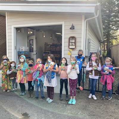 Troop 2005 delivered over 150 boxes of Girl Scout cookies to the Moscow Food Bank as a result of their Gift of Caring program with the cookie sale.