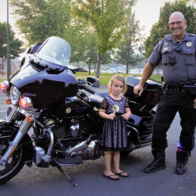Our granddaughter, Lila loved, to see the police motorcycle up close and Officer Woods was very friendly and kind. Taken by Mary Hayward, Aug. 7, 2018, at National Night Out, at Beachview Park in Clarkston.